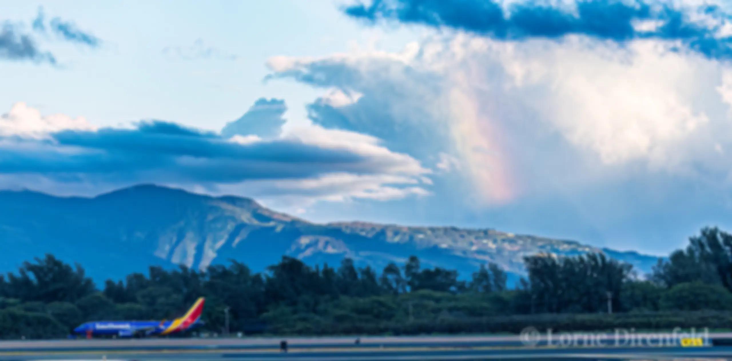 Southwest B737 in Kahului, in the morning with "rainbows" in the sky and on on the plane . . .