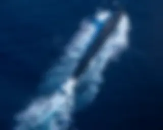 Pearl Harbor is the home of 18 nuclear submarines. When leaving or arriving, they surface or dive far off-shore, out of sight of land. When armed with nuclear weapons, they are accompanied in and out of the harbor by military helicopters . . .