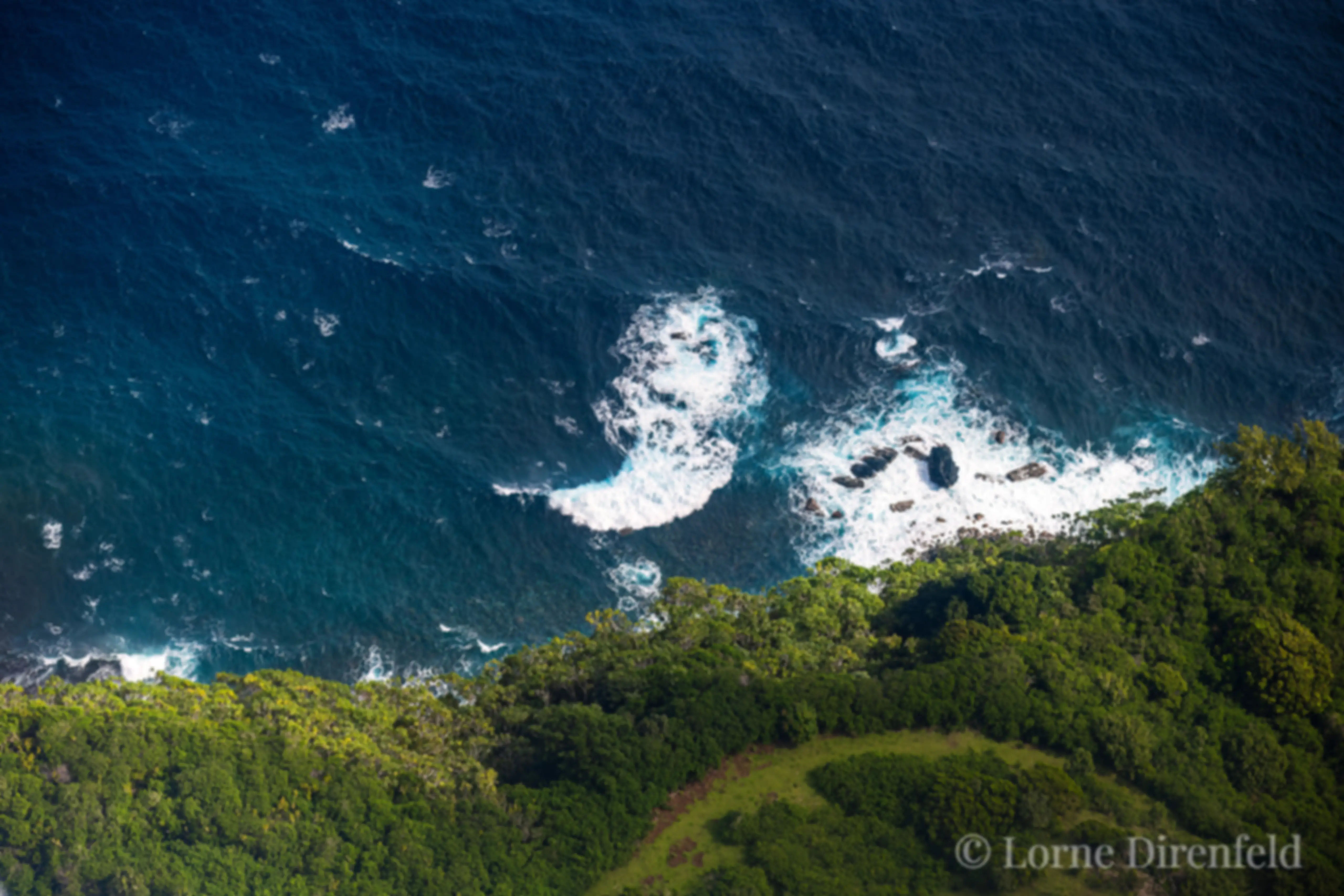 Looking down a cliff near Huelo on the north shore of Maui from 1000 feet above . . .