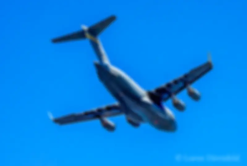 A C-17 Globemaster III with the Hawaii Air National Guard departs Kona airport . . .