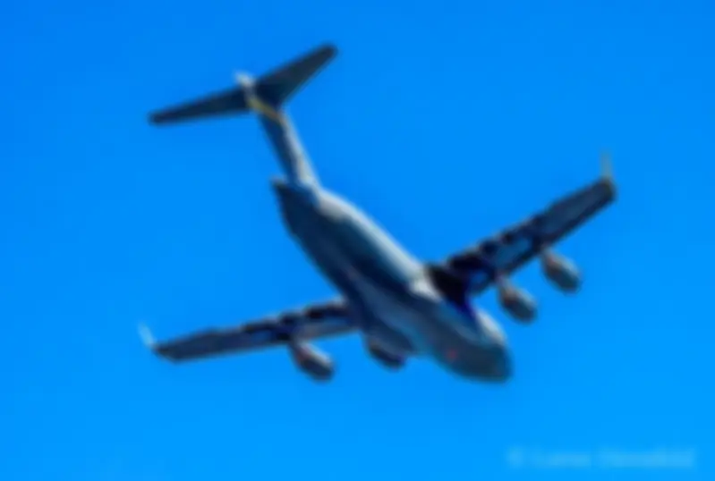A C-17 Globemaster III with the Hawaii Air National Guard departs Kona airport . . .